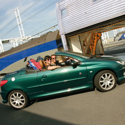 a car boarding the Folkestone to Calais Eurotunnel train service image of a car boarding the Folkestone to Calais Eurotunnel train service