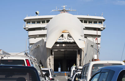 image of cars loading onto a ferry